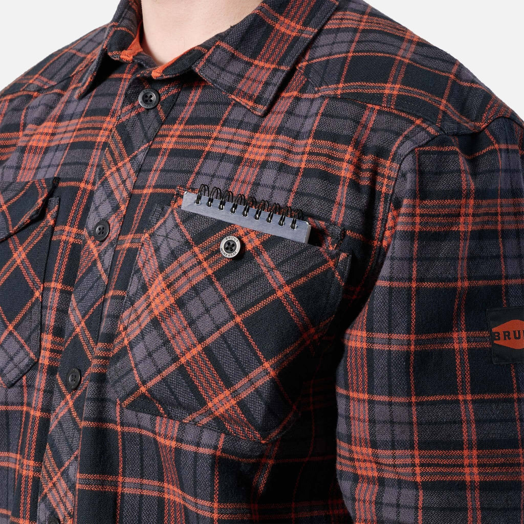 Front of chest pocket of the BRUNT heavy duty stretch work flannel in orang and black plaid * 2