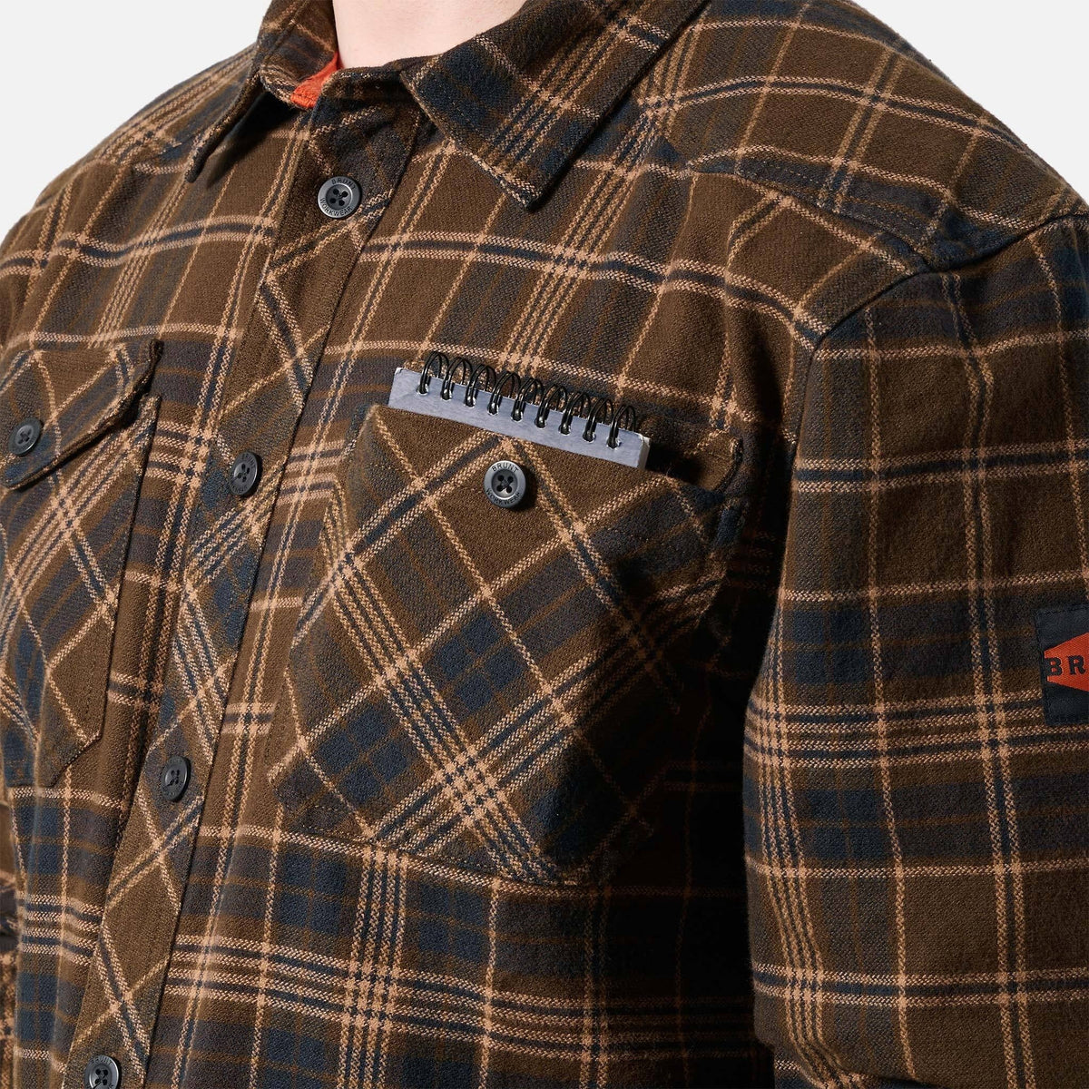 Front of chest pocket of the BRUNT heavy duty stretch work flannel in dark brown plaid * 4
