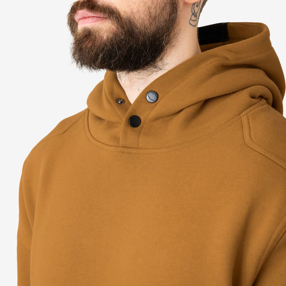 View 2 front of button snaps of the BRUNT water resistant shevlin work hoodie in saddle