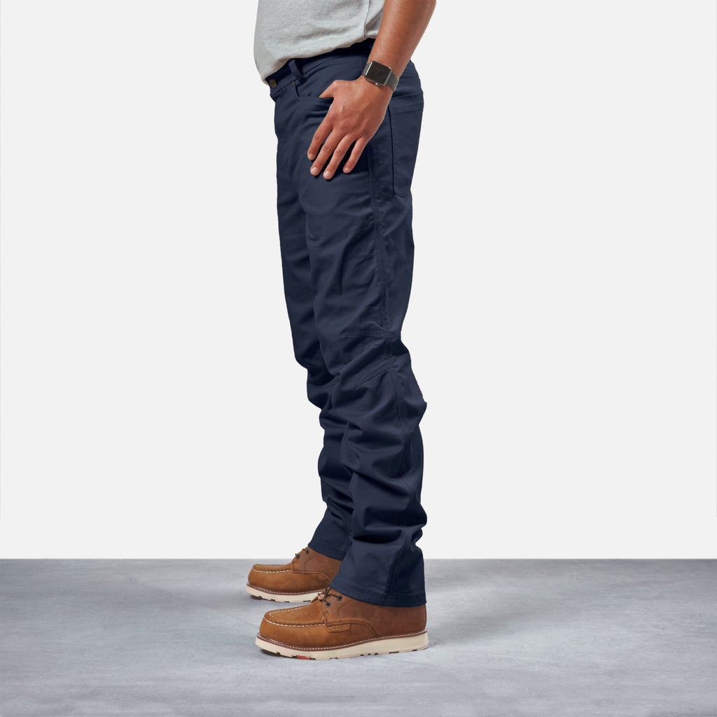 45 degree angle of front left side of BRUNT water resistant stretch torra work pant in dark navy