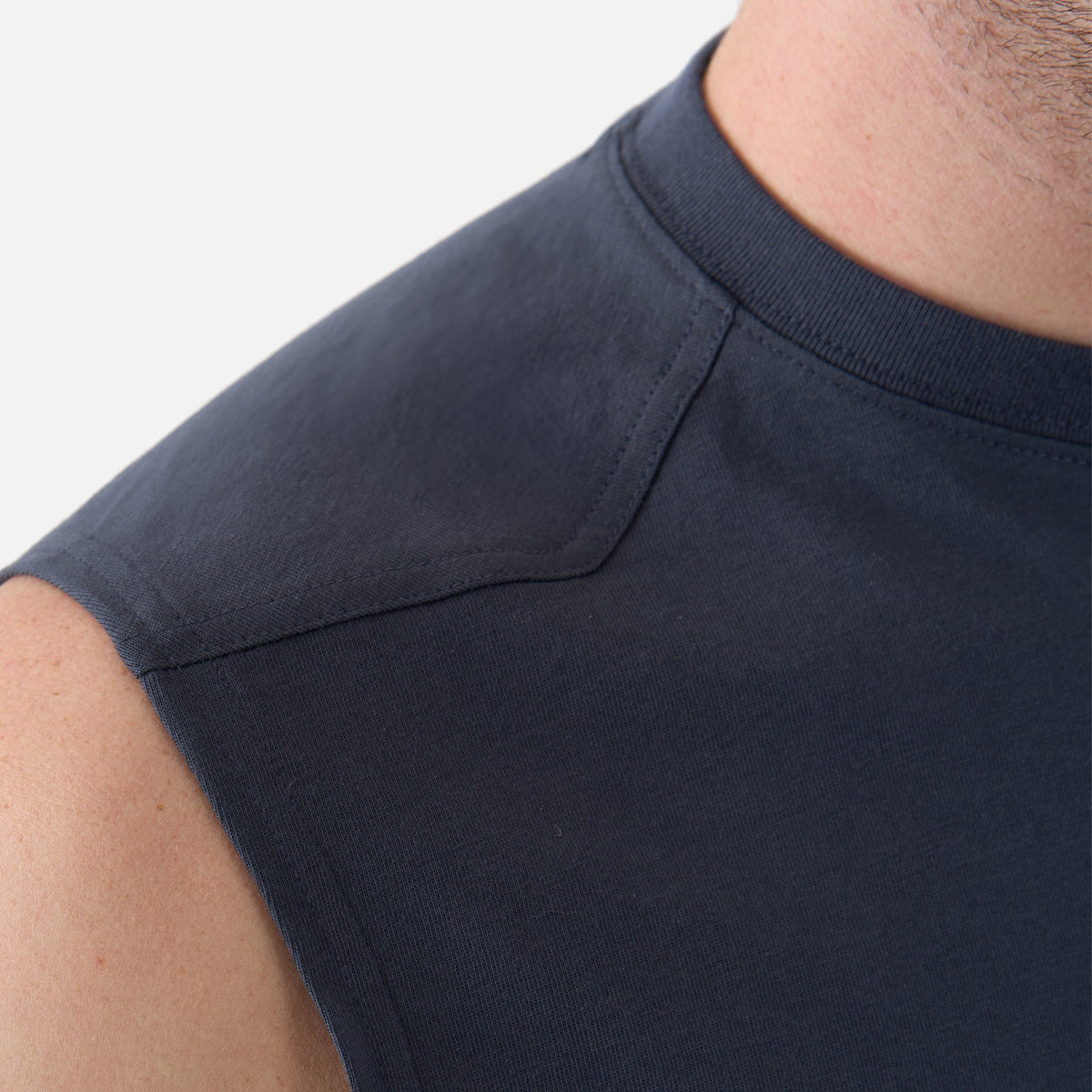 Close up of the drop shoulder of the BRUNT comfortable sleeveless pocket tee in navy blue * 4