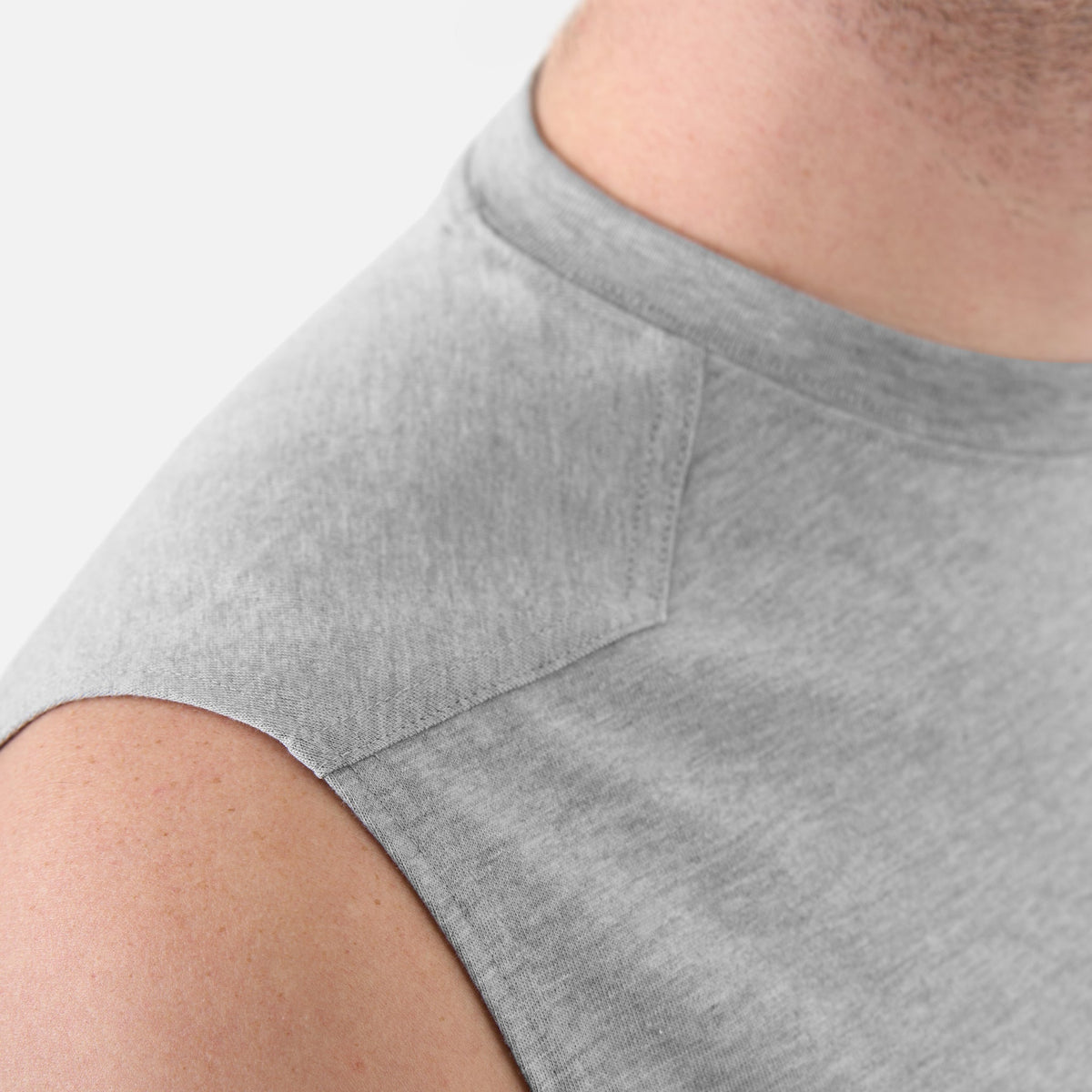 Close up of the drop shoulder of the BRUNT comfortable sleeveless pocket tee in light grey heather * 2
