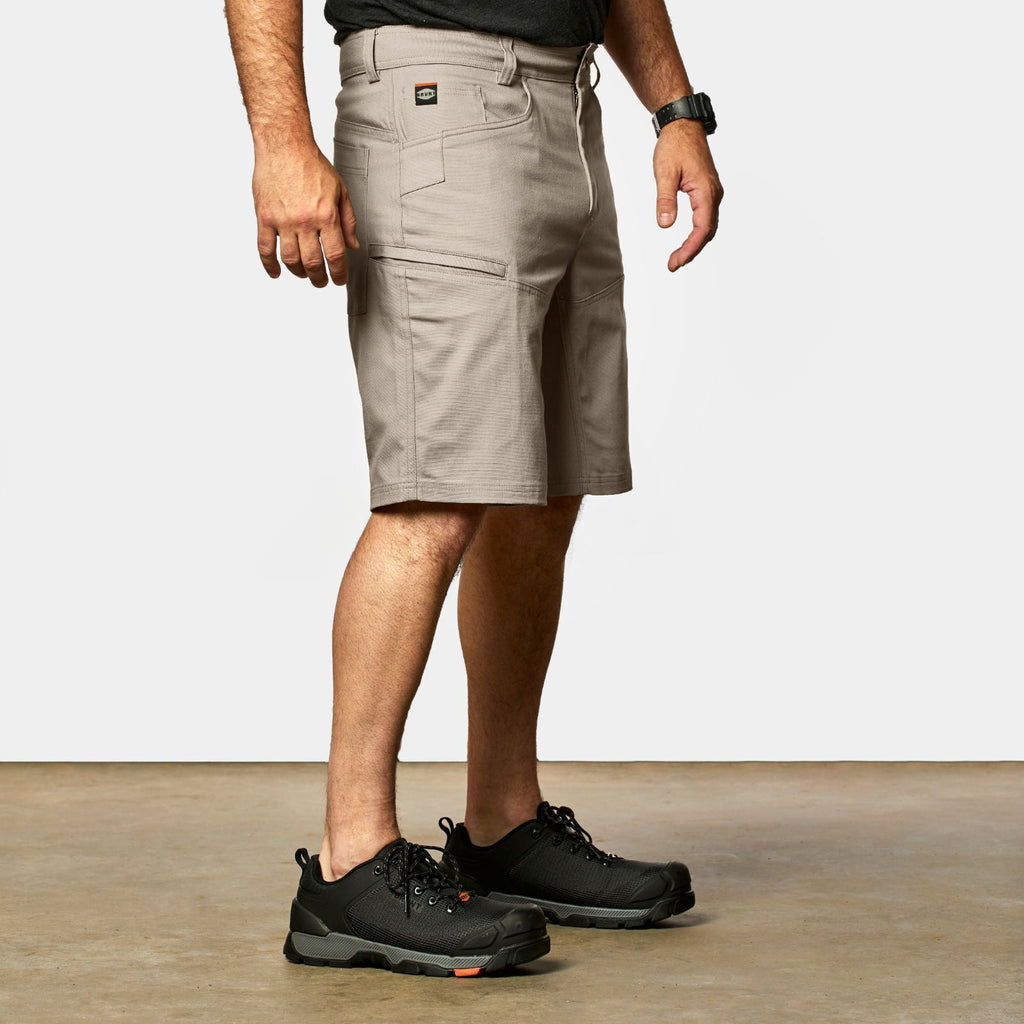 45 degree angle of front right side of BRUNT abrasion resistant torra hd work shorts in khaki * 1