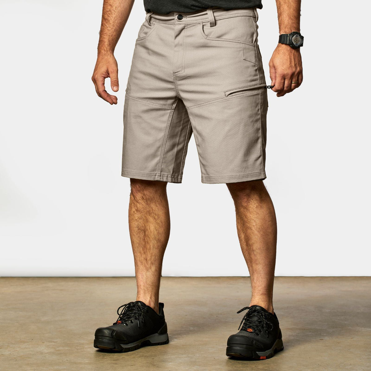 45 degree angle of front left side of BRUNT abrasion resistant torra hd work shorts in khaki * 1