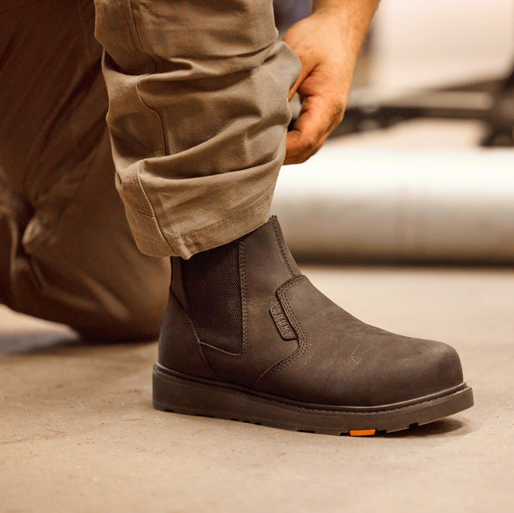 BRUNT 6 inch water-resistant slip-on ohman work boot in black on the jobsite