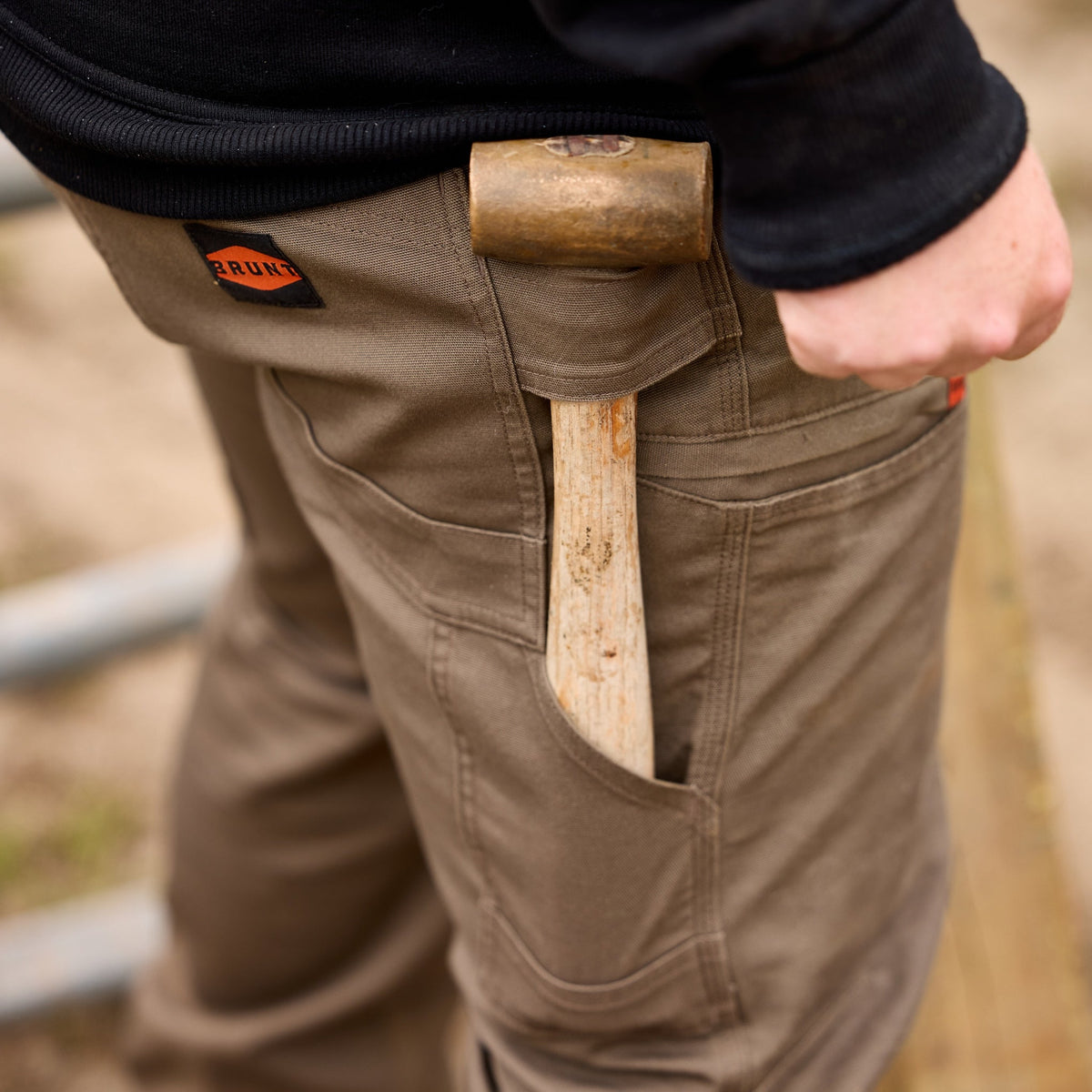 BRUNT water resistant double-knee torra hd utility work pant in brown with mallet in tool loop