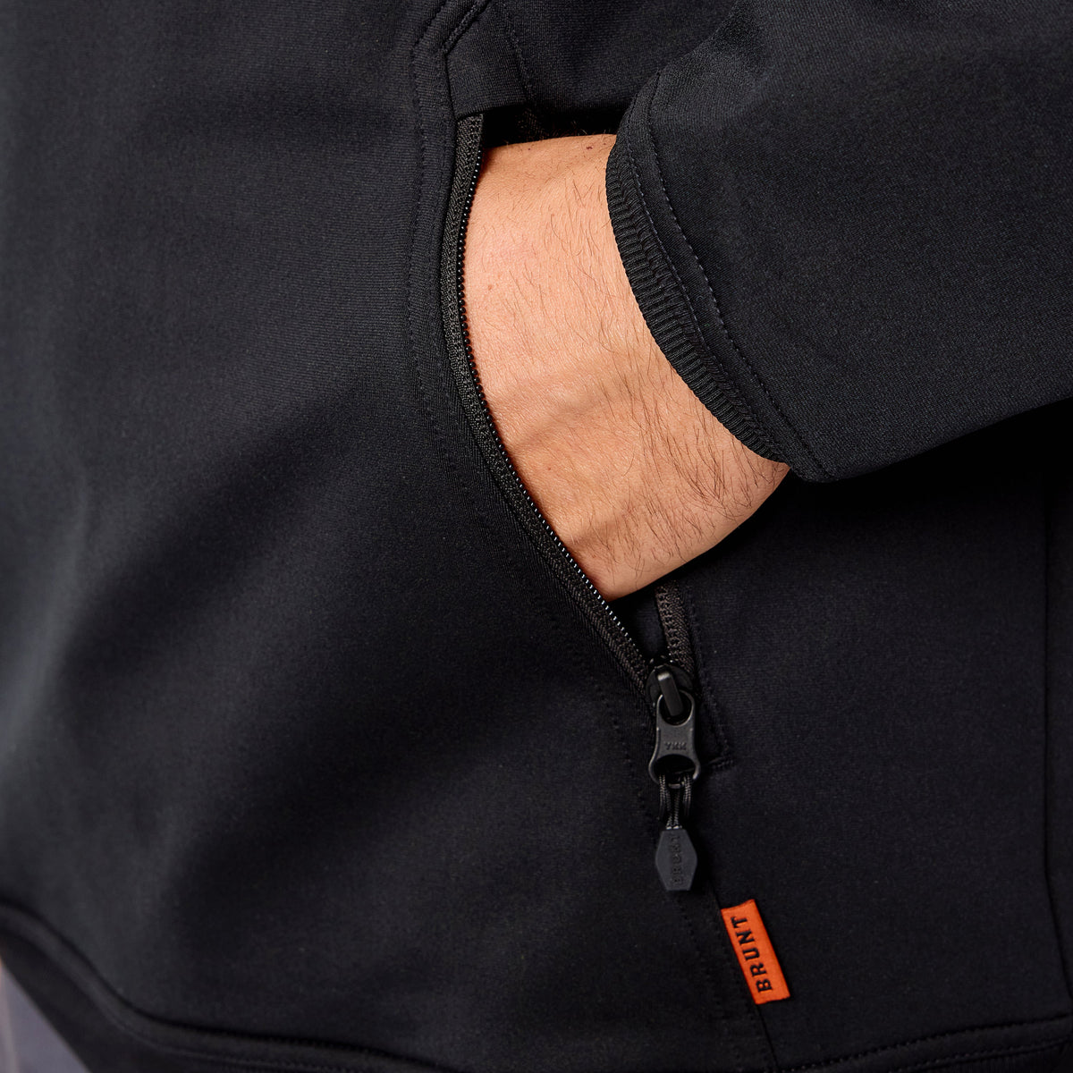 Front of hand pocket of the BRUNT light weight work hoodie in black * 1