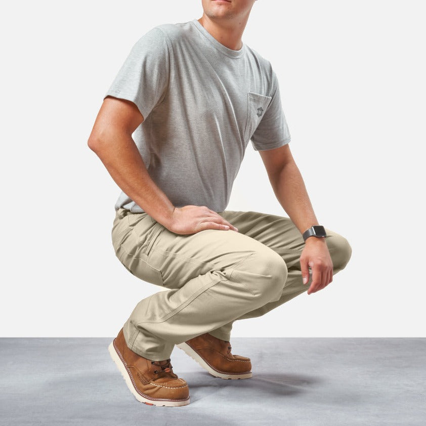 Squatting in BRUNT water resistant stretch torra work pant in khaki * 2