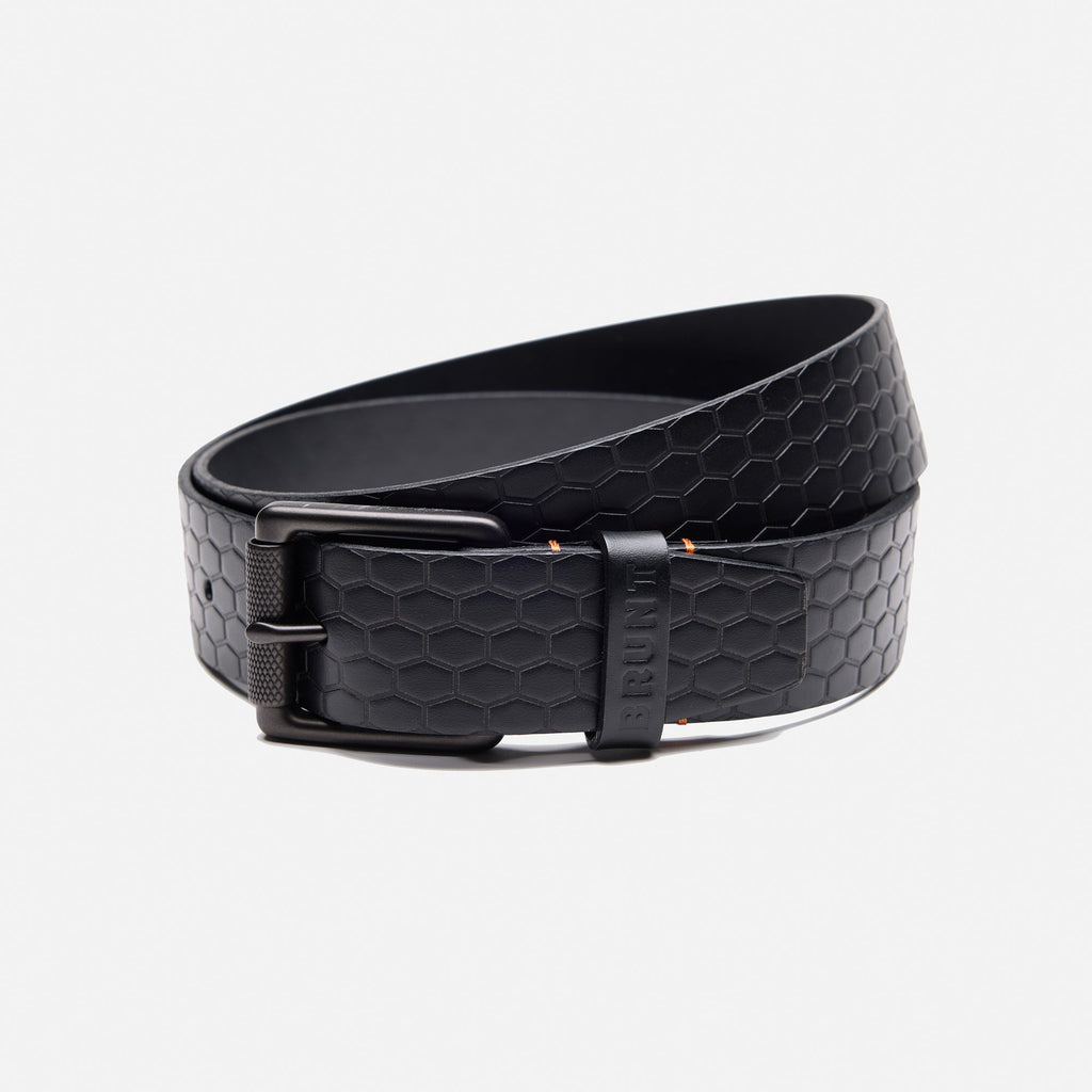 BRUNT leather belt with BRUNT logo pattern in black rolled up
