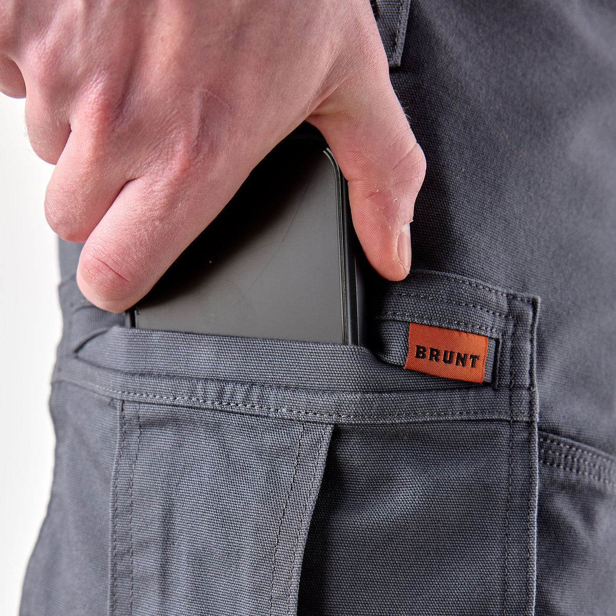 Putting phone in cargo pocket of BRUNT abrasion resistant cargo work shorts in charcoal * 2