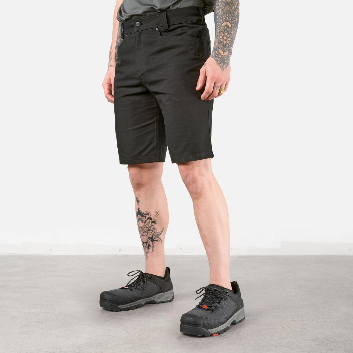 45 degree angle of front left of the BRUNT 11 inch water resistant stretch work short in black * 2