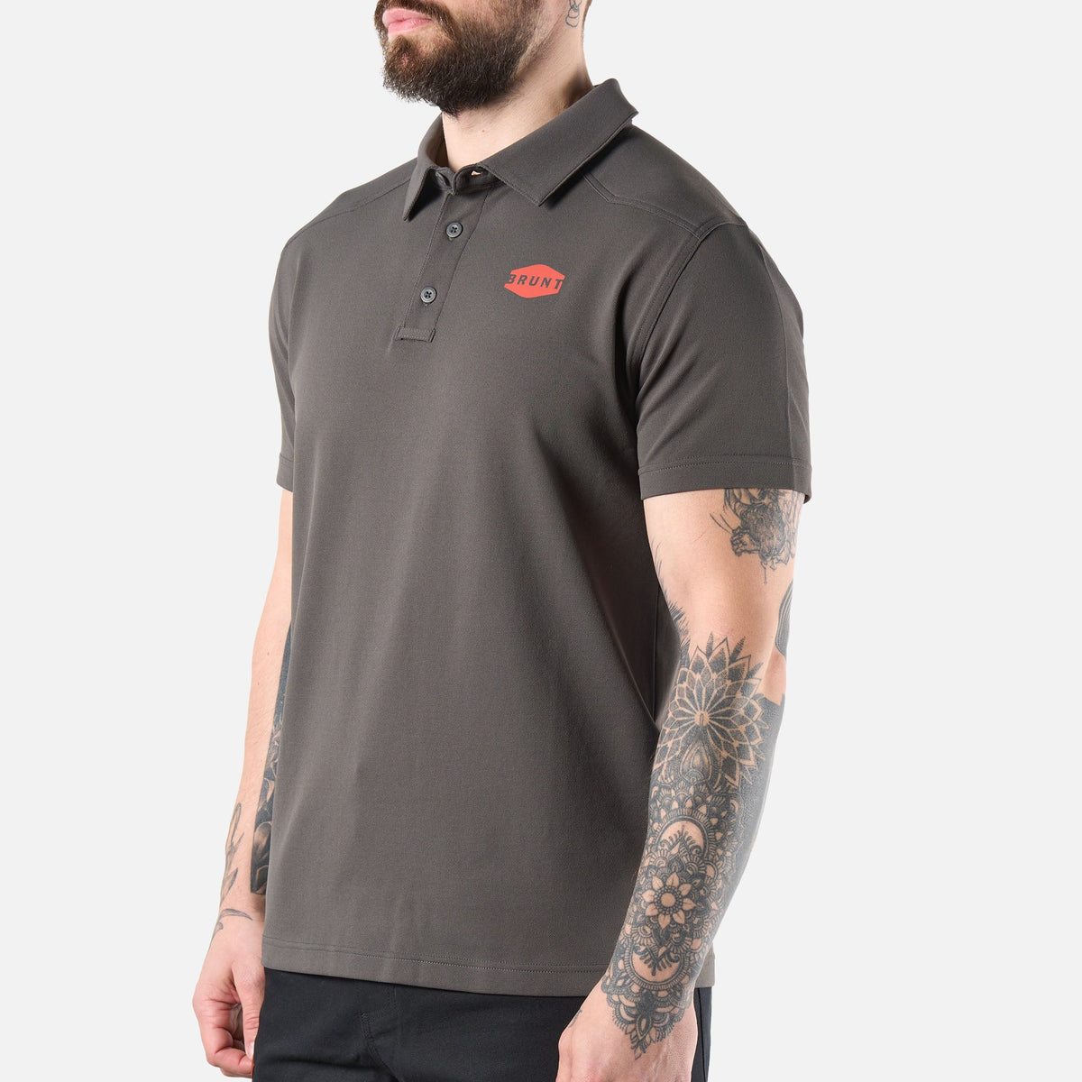 45 degree angle of the left of the BRUNT lightweight breathable polo with UPF protection in carbon * 0