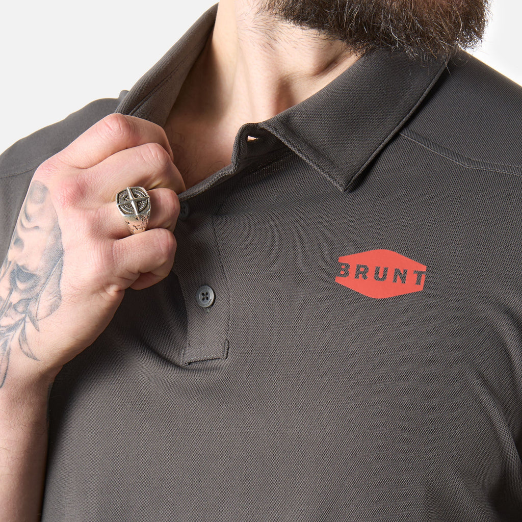 Close up of front collar of the BRUNT lightweight breathable polo with UPF protection in carbon * 0