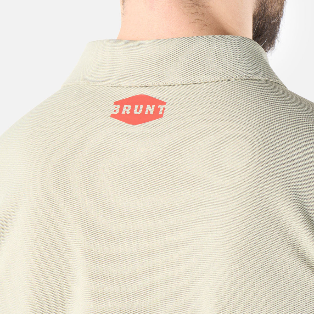 Close up of back collar of the BRUNT lightweight breathable polo with UPF protection in khaki * 2