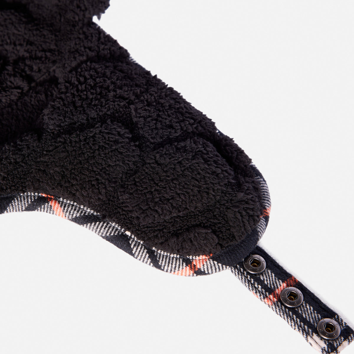 Close up of 45 degree angle of the front of the BRUNT heavy-duty insulated work hat ear flap insulation