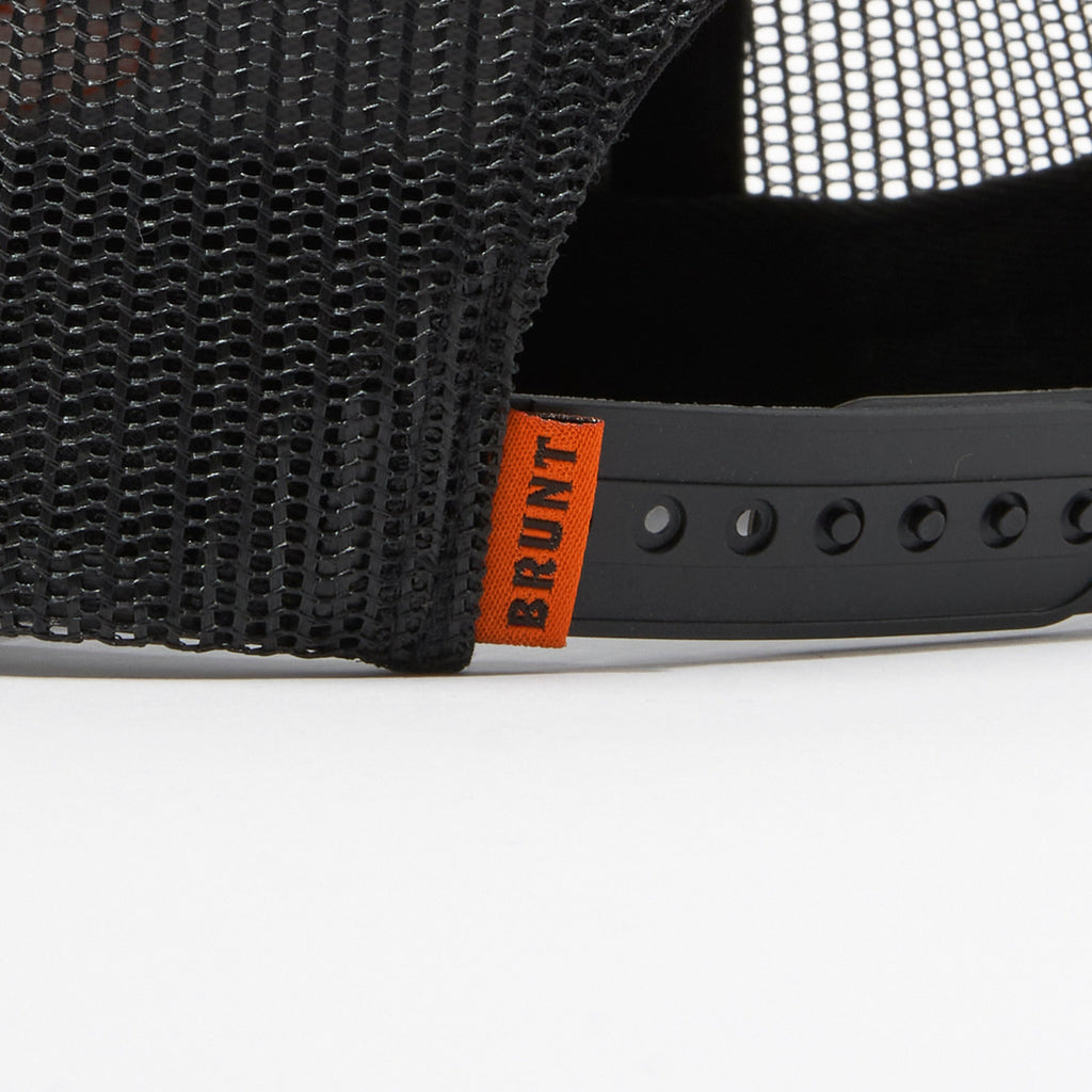 Back snaps of kids flat brim hat with built in pencil holder and BRUNT logo in black