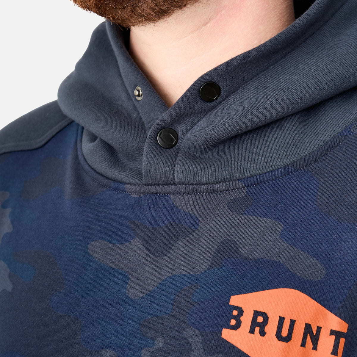 View 2 front of button snaps of the limited edition BRUNT water resistant shevlin work hoodie in blue camo * 1