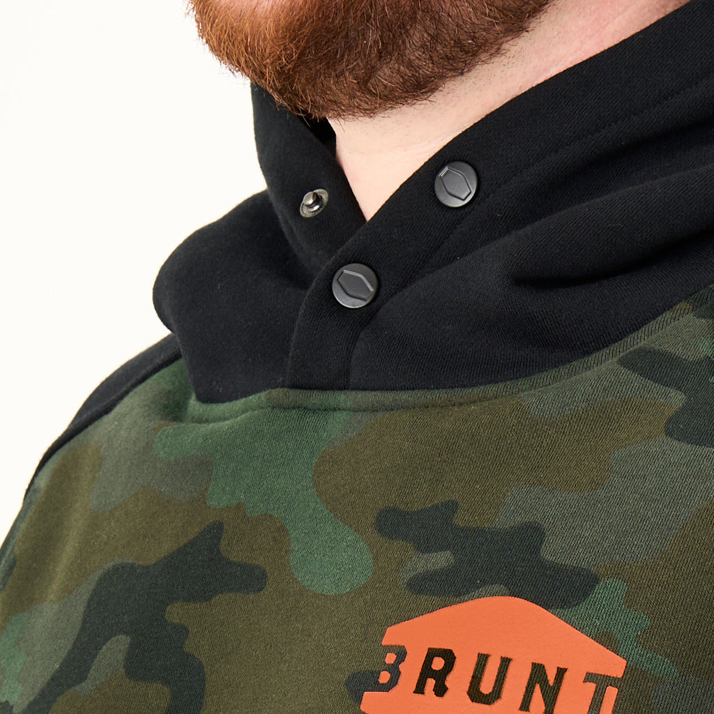 View 2 front of button snaps of the limited edition BRUNT water resistant shevlin work hoodie in green camo * 2