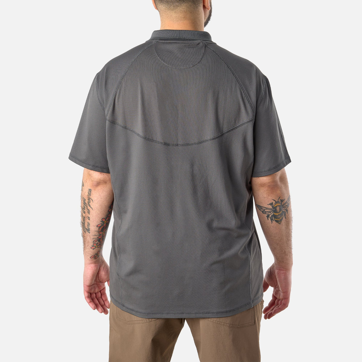 Back of the BRUNT lightweight breathable ventilated tech polo with UPF protection in carbon * 1