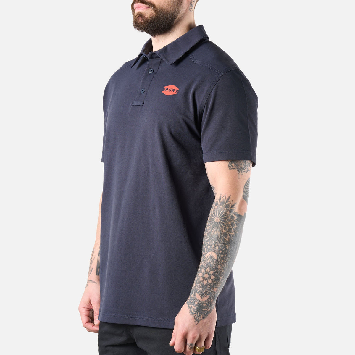 45 degree angle of the left of the BRUNT lightweight breathable polo with UPF protection in navy * 3