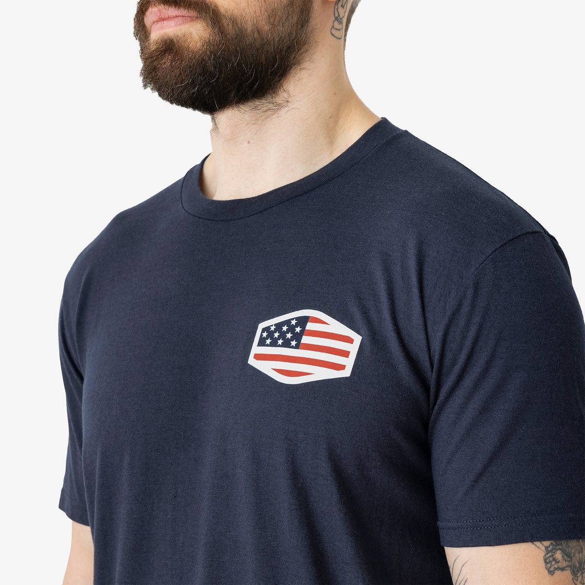 Close up of the front logo of the limited edition BRUNT high quality t-shirt in dark navy