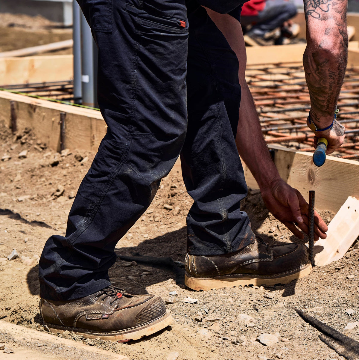 BRUNT USA 6 inch welted waterproof reinforced composite toe work boot in dark brown on the jobsite