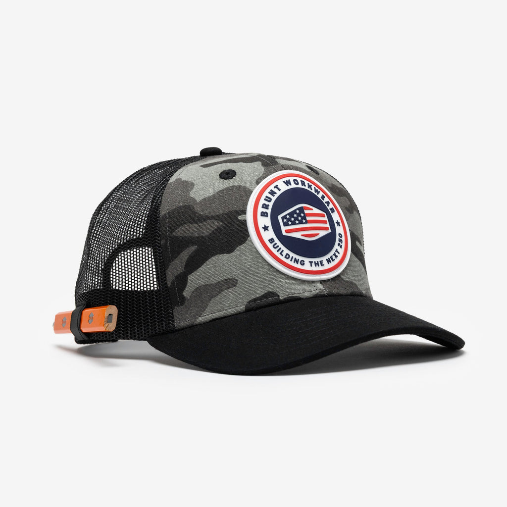 45 degree angle of front of BRUNT curved brim work hat with built in pencil holder and BRUNT usa 250 logo in limited edition black camo