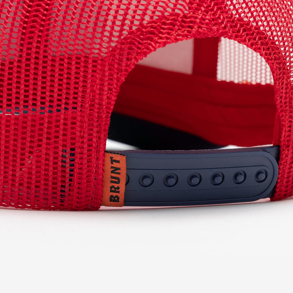 Back snaps of curved brim work hat with built in pencil holder and BRUNT usa 250 logo in limited edition red white and blue