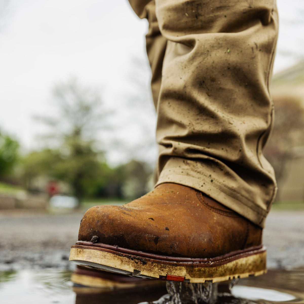 BRUNT 9 inch waterproof soft toe roper bolduc work boot in brown on the job stepping in water