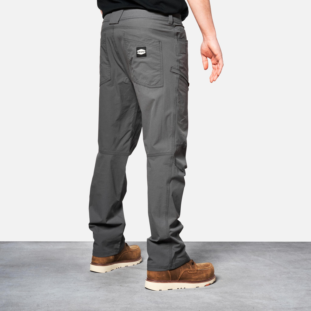 45 degree angle of back right side of BRUNT water-resistant lightweight lined costello work pant in charcoal