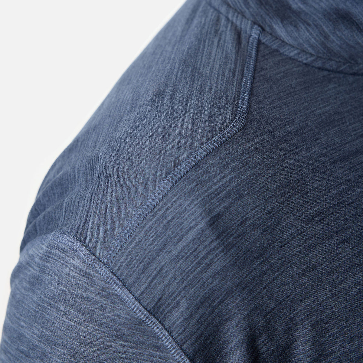 Close up of shoulder detailing of the BRUNT lightweight quarter zip sun shirt with UPF protection in blue heather * 3