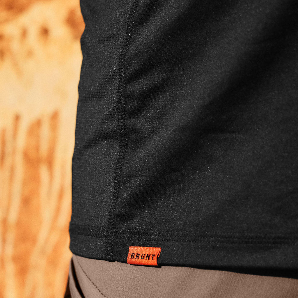 Close up of breathable mesh of the BRUNT lightweight quarter zip sun shirt with UPF protection in black on jobsite * 1