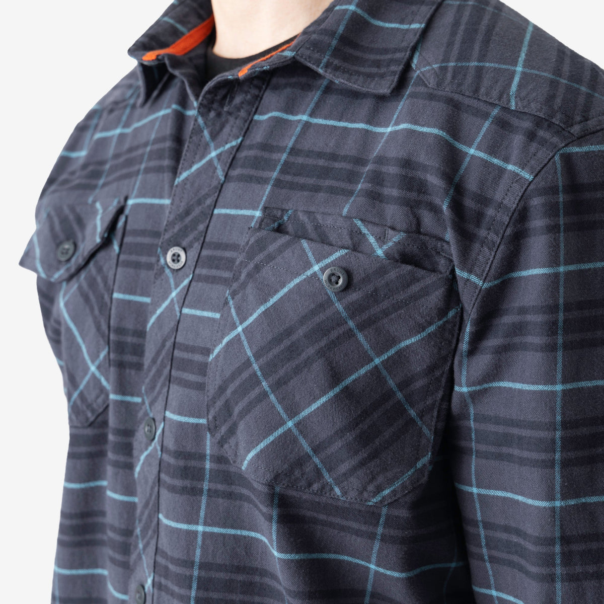 Front chest pocket of BRUNT comfortable stretch work flannel in blue plaid