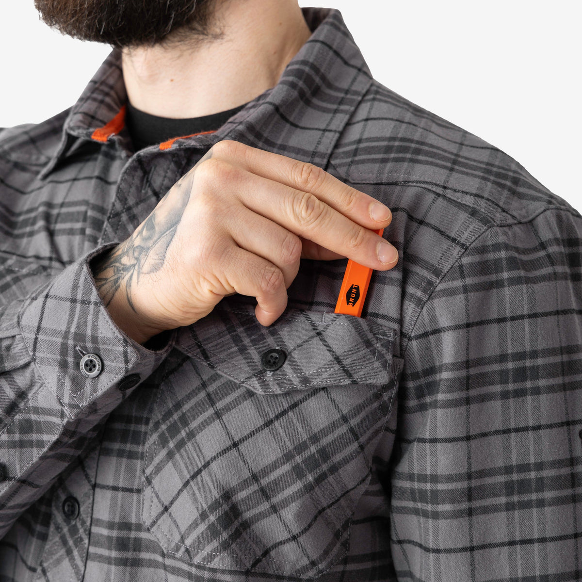 Front chest pocket with pencil slot of BRUNT comfortable stretch work flannel in grey plaid
