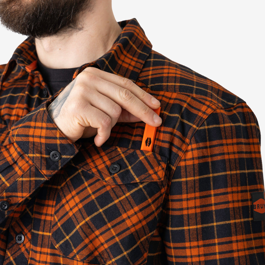Front chest pocket with pencil slot of BRUNT comfortable stretch work flannel in orange plaid