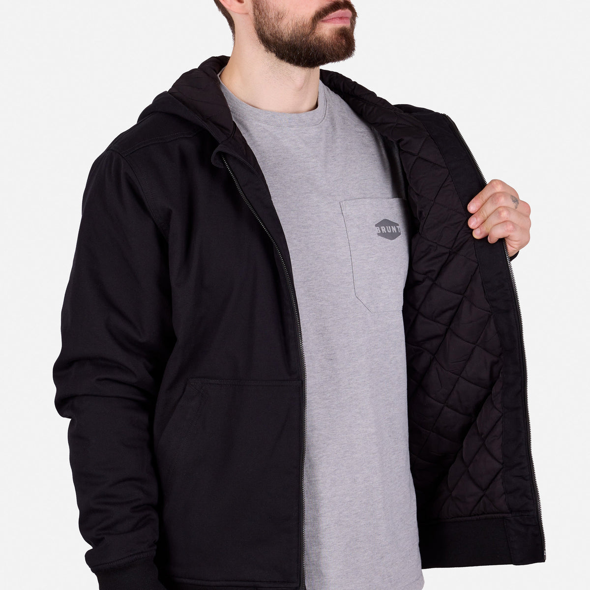 Front of BRUNT ultra durable couvee utility work jacket with hoodie in black