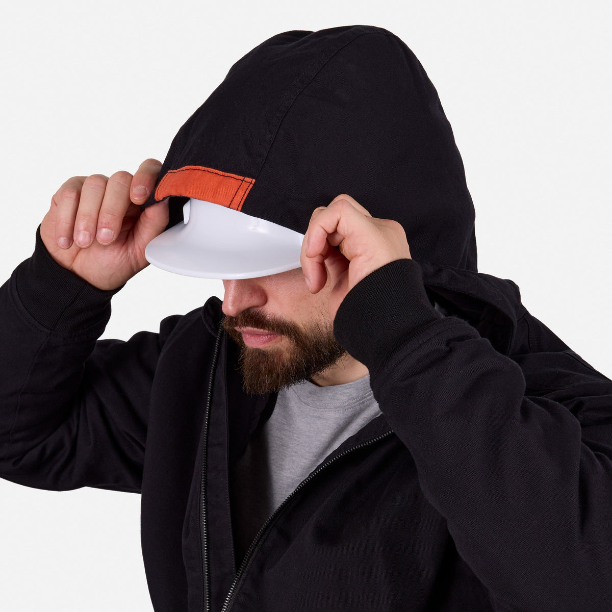 Hard hat compatible hood of the BRUNT ultra durable couvee utility work jacket with hoodie in black