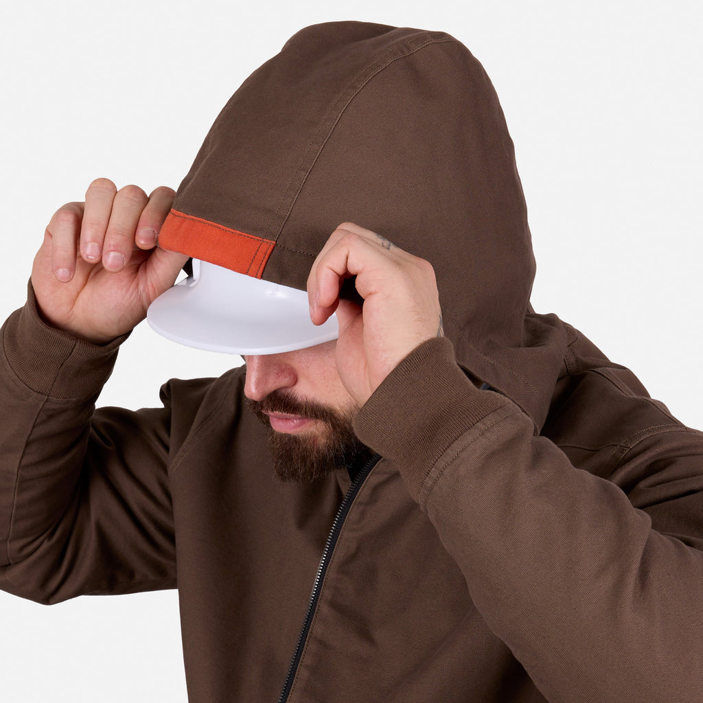 Hard hat compatible hood of the BRUNT ultra durable couvee utility work jacket with hoodie in brown