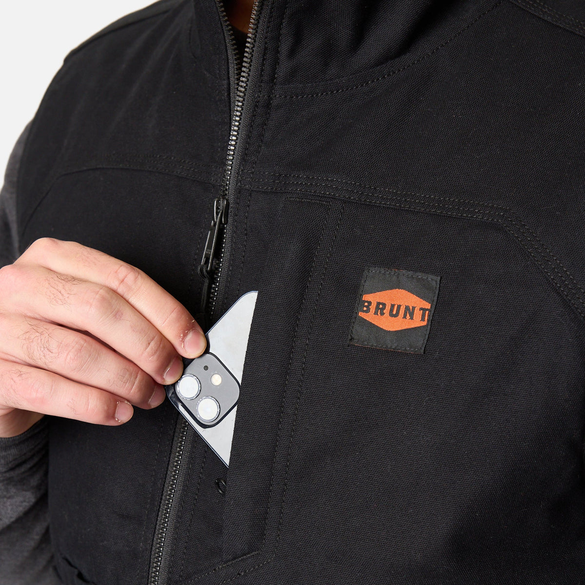 Front of chest phone pocket of the BRUNT quilted stretch canvas work vest in black * 0