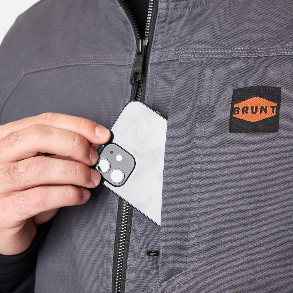 Front of chest phone pocket of the BRUNT quilted stretch canvas work vest in charcoal * 1
