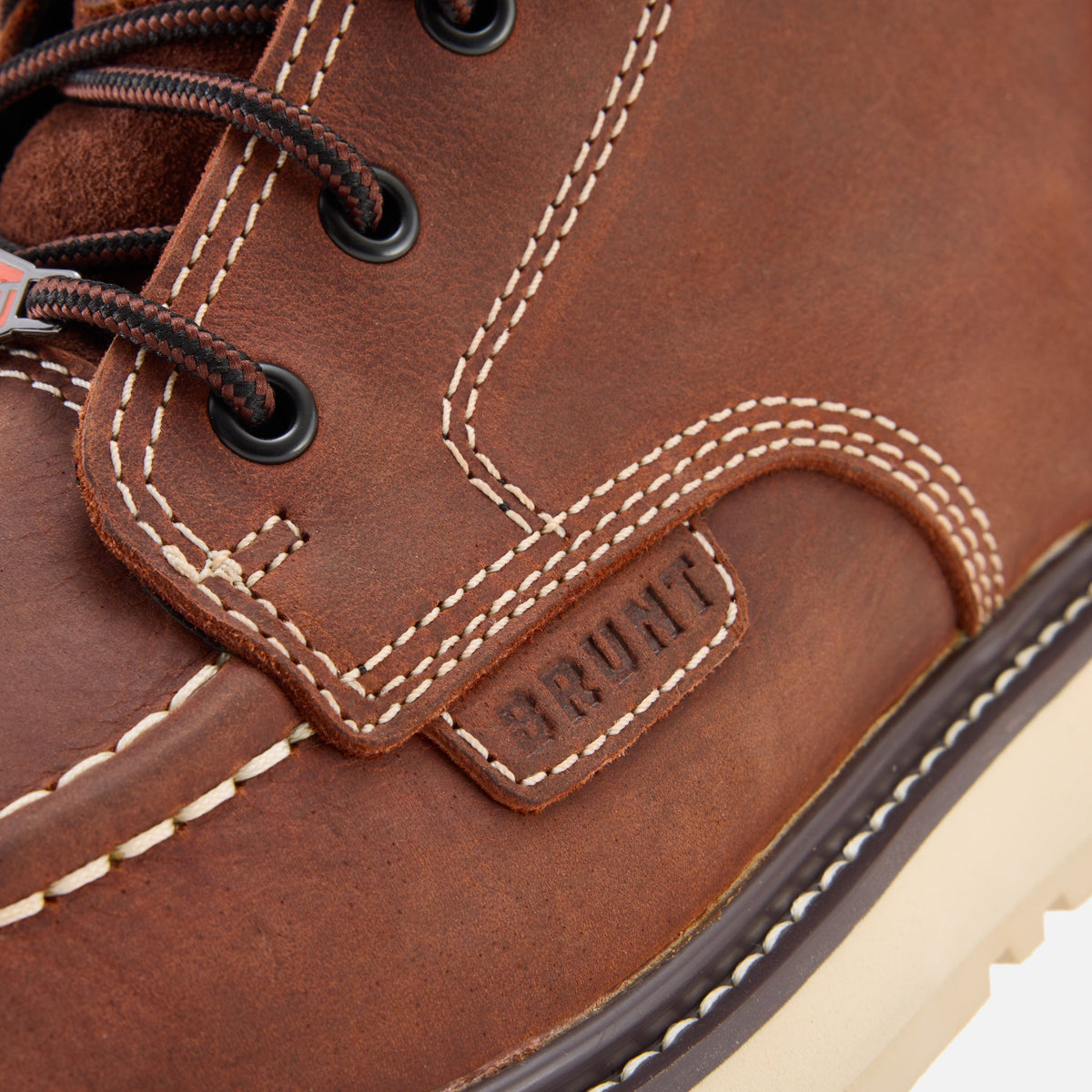 Close up details of the limited edition BRUNT 6 inch waterproof moc toe marin work boot in redwood