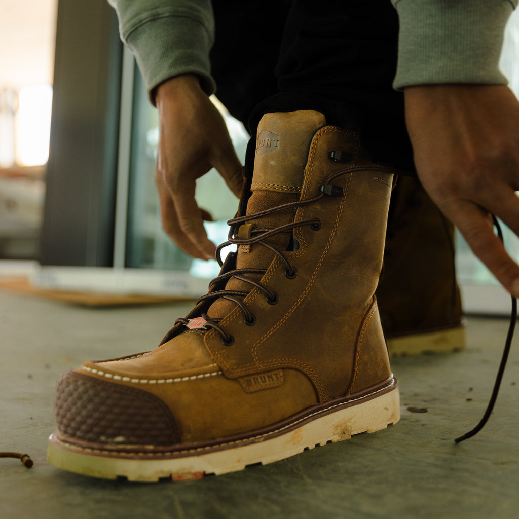 BRUNT 8 inch waterproof reinforced composite toe marin work boot in brown on jobsite