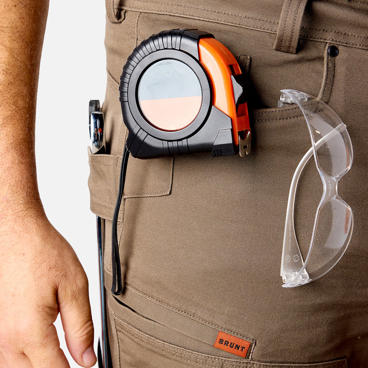 View 2 front pocket reinforcements of BRUNT water resistant double-knee torra hd utility work pant in brown to hold tools * 1