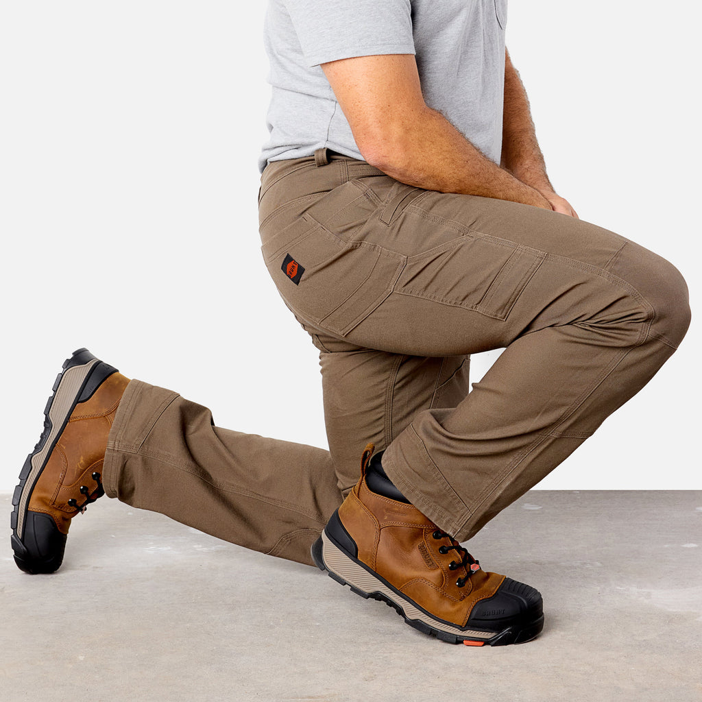 Sitting on one knee in BRUNT water resistant double-knee torra hd utility work pant in brown * 1