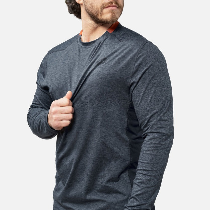 View 2 stretching chest of the BRUNT lightweight mckenna long sleeve sun tee with UPF protection in blue heather * 1