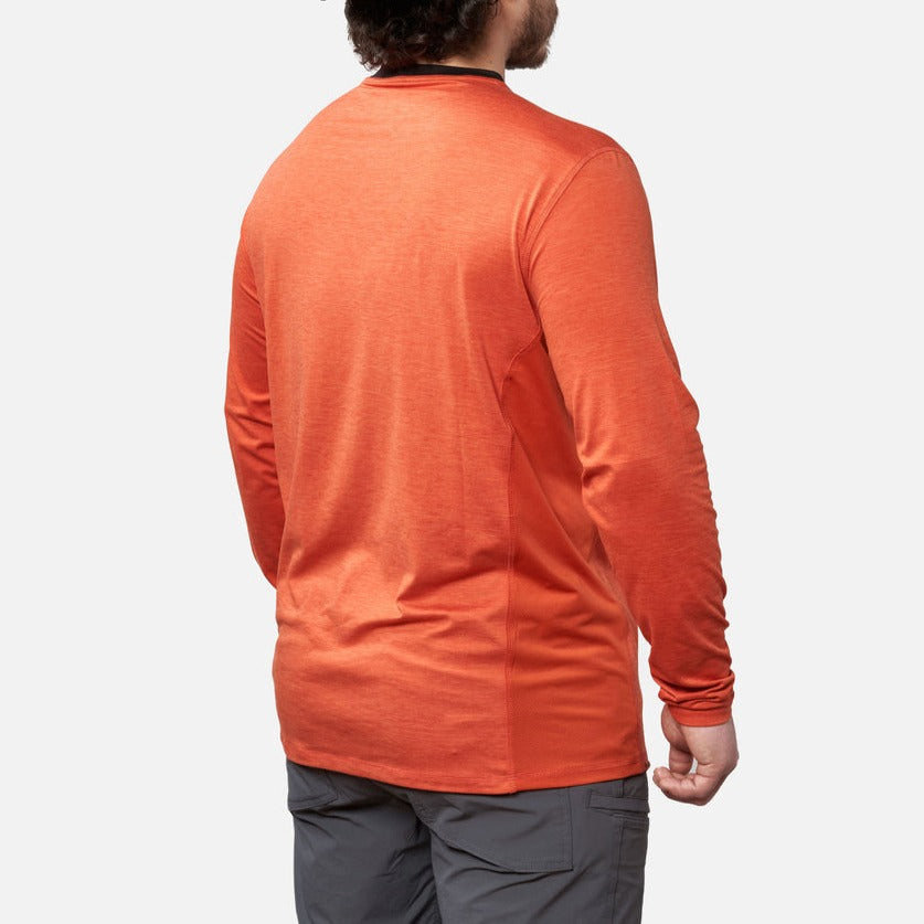 45 degree angle of the back right of the BRUNT lightweight mckenna long sleeve sun tee with UPF protection in BRUNT orange * 3