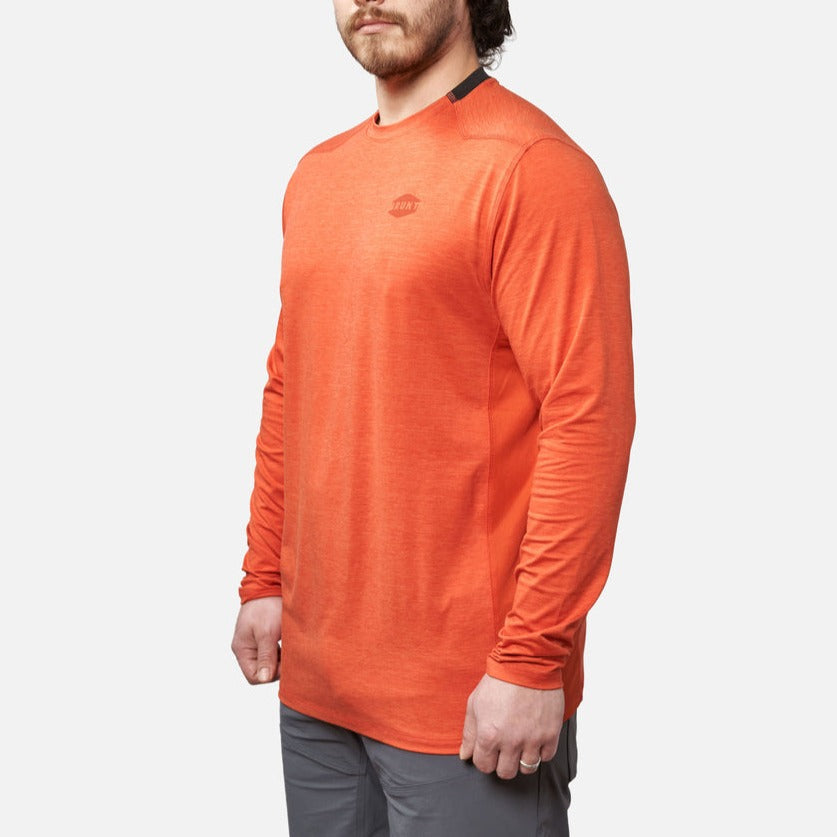 45 degree angle of the front left of BRUNT lightweight mckenna long sleeve sun tee with UPF protection in BRUNT orange * 3