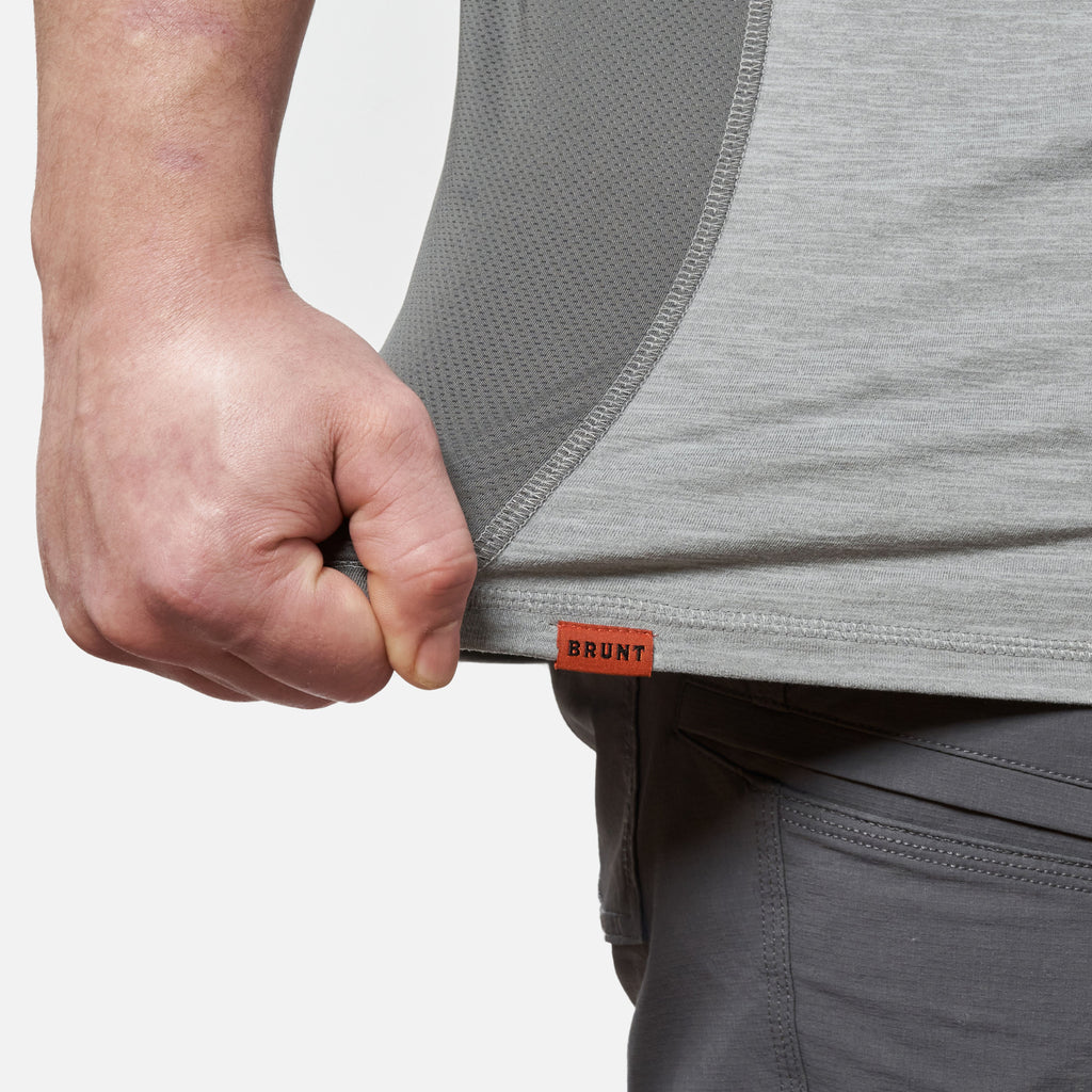 View 2 stretching hemline of the BRUNT lightweight mckenna sun tee with UPF protection in grey heather * 2