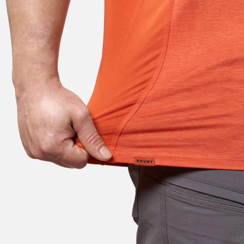 View 2 stretching hemline of the BRUNT lightweight mckenna sun tee with UPF protection in BRUNT orange * 0