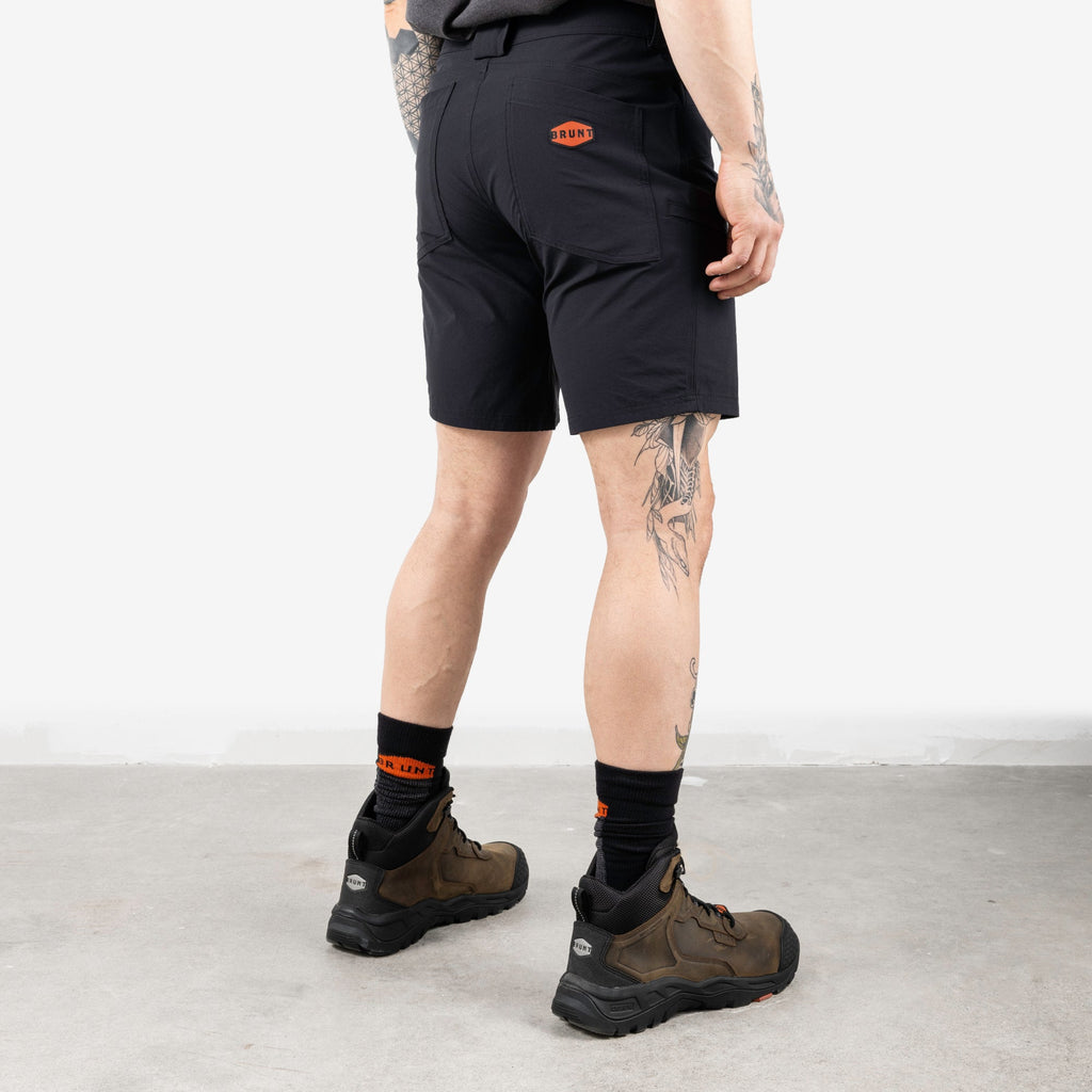 45 degree angle of back right side of BRUNT 9 inch lightweight breathable costello work shorts in black